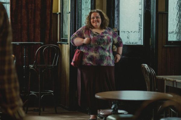 Jessica Gunning as Martha standing in a pub.