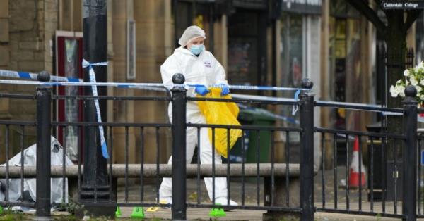 Police activity outside the Victoria Theatre in Fountain Street, near to the scene of a triple stabbing in Commercial Street in Halifax, West Yorkshire. One man has died and another is fighting for his life after three men were stabbed in the early hours of Sunday morning. Picture date: Sunday October 1, 2023. PA Photo. Officers were called to the incident at 3.48am following reports that three men had been assaulted, West Yorkshire Police said. All three were rushed to hospital with stab wounds wher<em></em>e one of them died shortly after. A second man is in a critical co<em></em>ndition while the third is being treated for non-life threatening injuries. See PA story POLICE Halifax. Photo credit should read: Danny Lawson/PA Wire