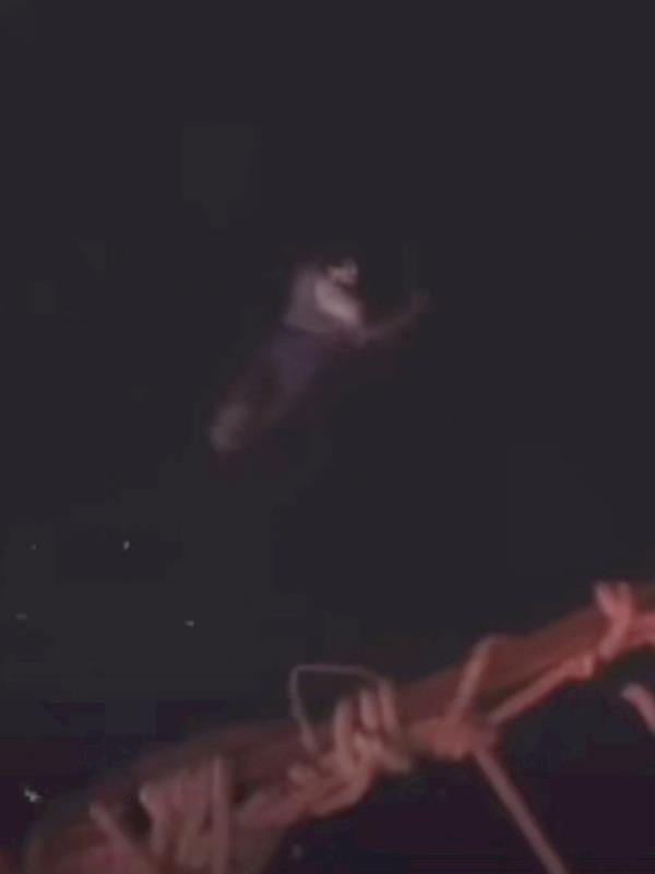 Cameron Robbins is seen in the water moments after jumping from the Blackbeard's Revenge. 