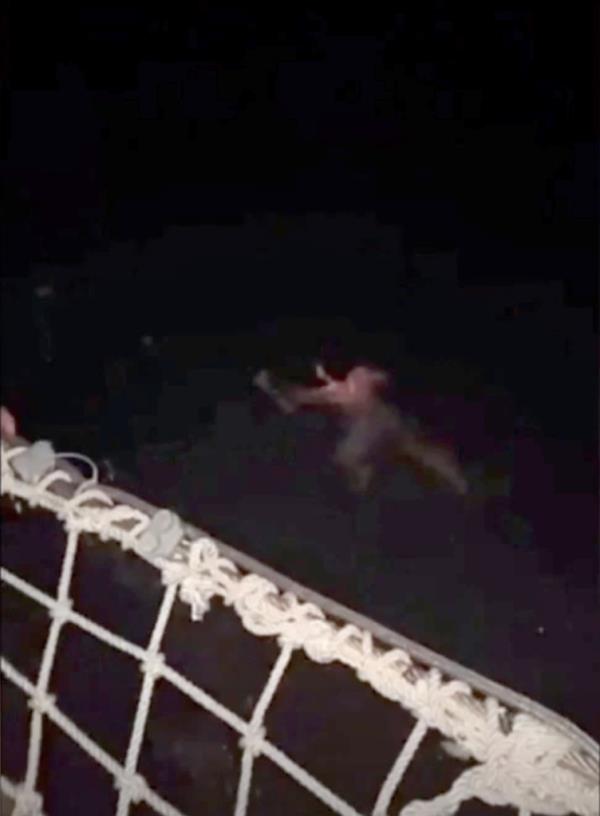 Cameron Robbins is seen in the water moments after jumping from the Blackbeard's Revenge.