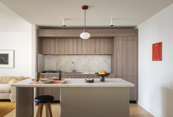 The building offers sleek kitchens.