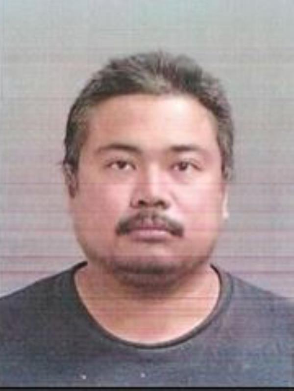 A mugshot of Kenneth Quilaton, the allege home intruder.