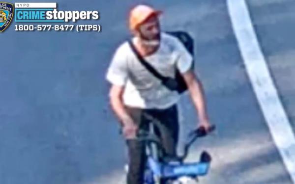 A photo of the wanted suspect in the Ripp attack in Central Park: a man with a slim build and medium complexion, last seen wearing an orange ba<em></em>seball cap, white T-shirt, black pants, black sneakers and carrying a cross-body bookbag, cops said.