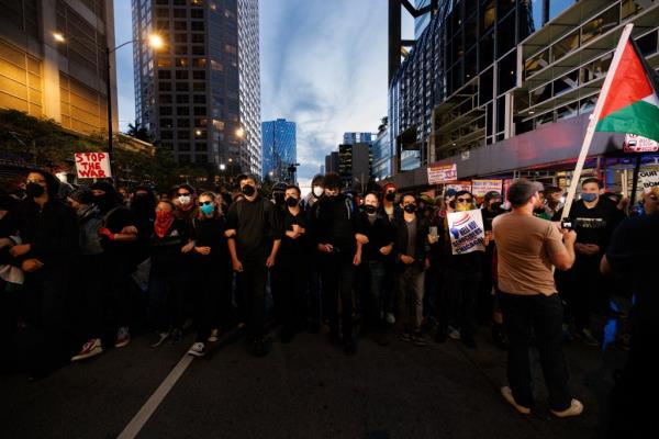 A crowd of anti-Israel protesters marching near the consulate.