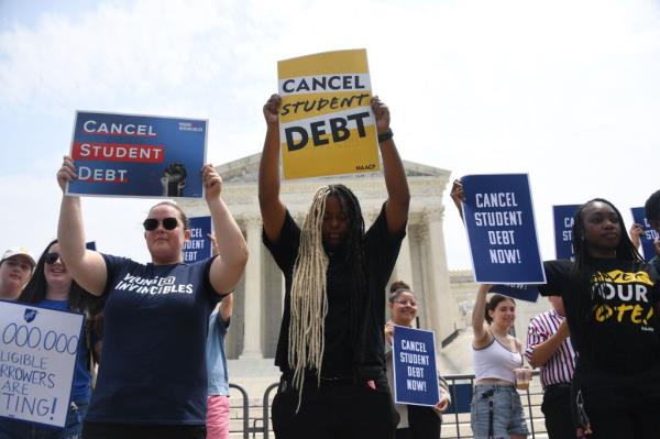 Supporters of student debt forgiveness demo<em></em>nstrate outside the US Supreme Court on June 30, 2023, in Washington, DC.
