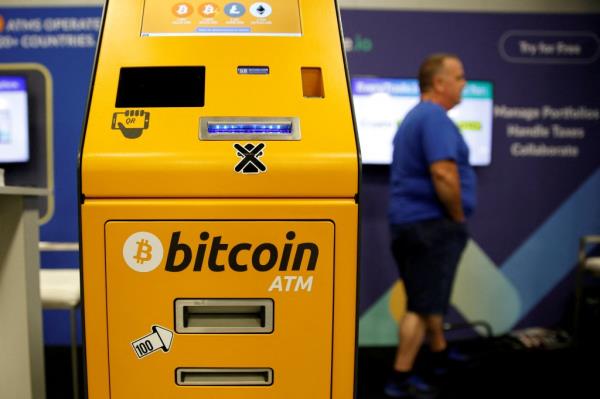A bitcoin ATM is seen at a stand during the Bitcoin Co<em></em>nference 2022 in Miami Beach, Florida, U.S. April 6, 2022.