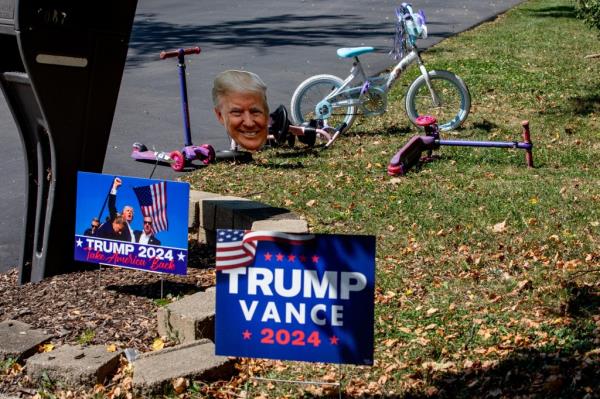 Lawn signs supporting former President and Republican presidential nominee Do<em></em>nald Trump displayed in Beverly Hills, Michigan, U.S. on September 5, 2024