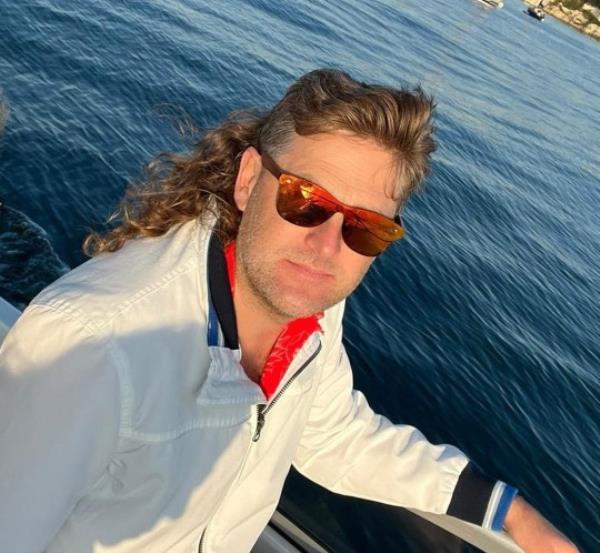 BNPS.co.uk (01202) 558833. Pic: AlastairBush/BNPS A British GP is to compete in the World Mullet Growing Champio<em></em>nships in Australia - and has vowed to beat them at their own game. The aptly-named Dr Alastair Bush, from Bovington, Dorset, won his internatio<em></em>nal heat at Mulletfest in New South Wales in February. Now he has his eyes on the grand prize when he returns down under for the finals next month. Should he win Alastair said he plans to cut his mullet off, burn it and put it in an urn, just like the Ashes in cricket.