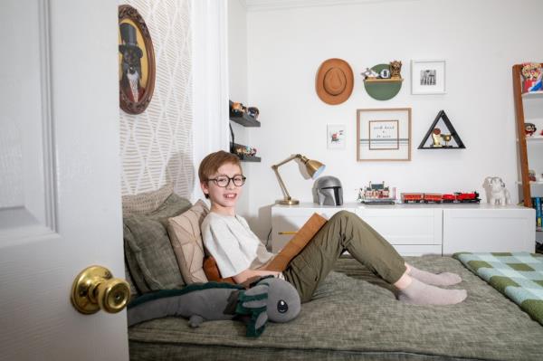 Luke Miller, 11, in his bedroom.