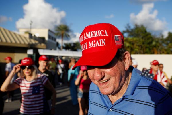 Person in Make America Great Again hat