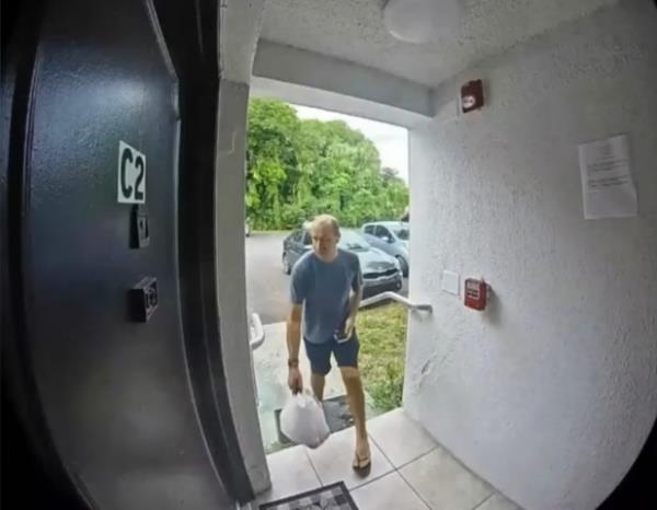 The DoorDash driver was caught on a doorbell camera spitting in the customer's food order. 