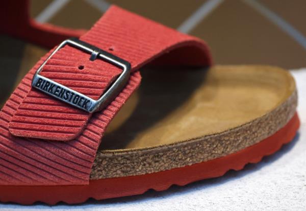 Close up view of a red Birkenstock sandal on display in a Lo<em></em>ndon shoe store during internatio<em></em>nal expansion in October 2023.