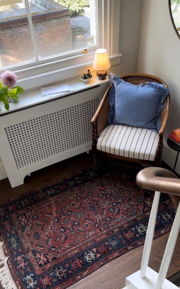 Ananya's living room with painted radiator cover. 