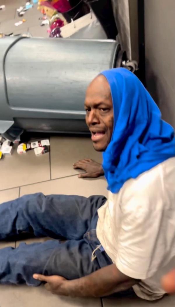 The suspect stole several packs of cigarettes and other items before fleeing.