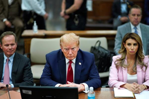 Do<em></em>nald Trump sitting inside the courtroom.
