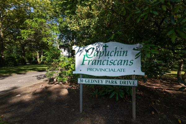 A photo of the sign Capuchin Franciscans in White Plains.