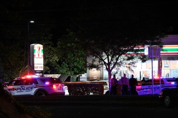 A nighttime shot of the crime scene on Long Island, near a 7-Eleven