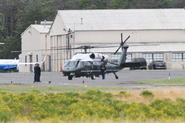 President Joe Biden, left, and first lady Jill Biden arrive on Marine One at East Hampton Airport, Saturday, June 29, 2024, in East Hampton, N.Y. 