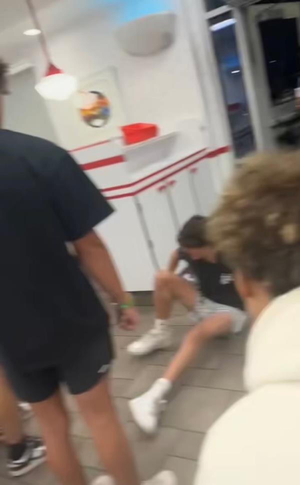 The teen – who has not been named publicly – was tossed o<em></em>nto the tile while his friends looked on.