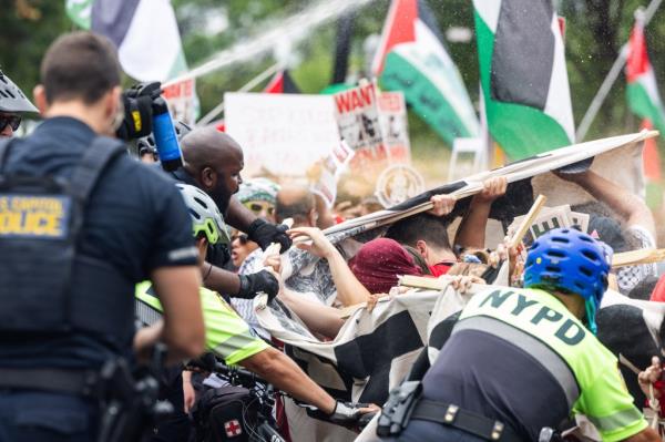 Protesters clashing with Captiol Police officers near Capitol Hill.