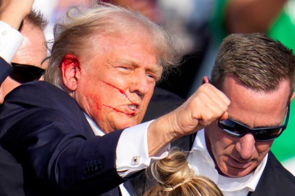  Do<em></em>nald Trump reacts following an assassination attempt at a campaign event in Butler, Pa., on Saturday, July 13, 2024. 
