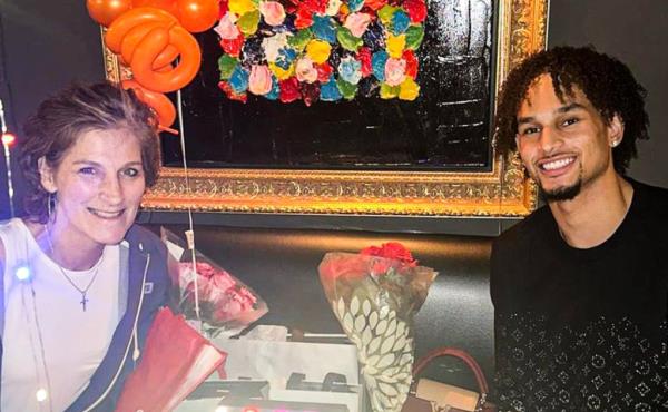 Dereck Lively poses for a photo with his mother Kathy Drysdale. 