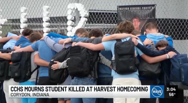 CCHS students co<em></em>nsole each other at a makeshift memorial set up at the school following Gerlach's death.