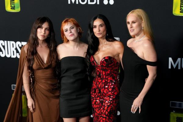 Scout LaRue Willis, Tallulah Willis, Demi Moore, and Rumer Willis attend the Los Angeles Premiere Of 
