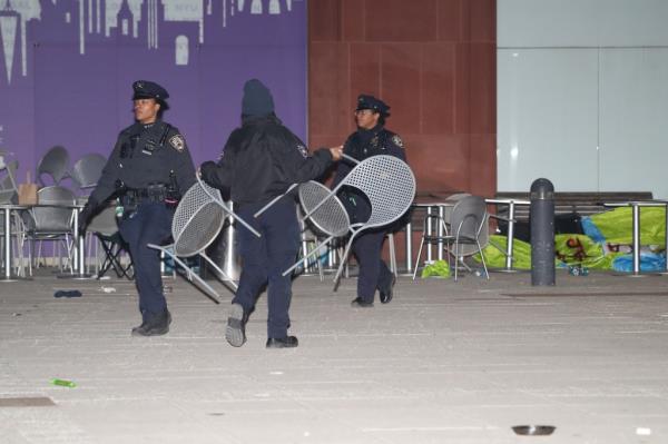 NYPD officers were pelted with trash after they raided an anti-Israel rally at NYU.  
