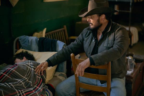 Cole Hauser in a cowboy hat. 