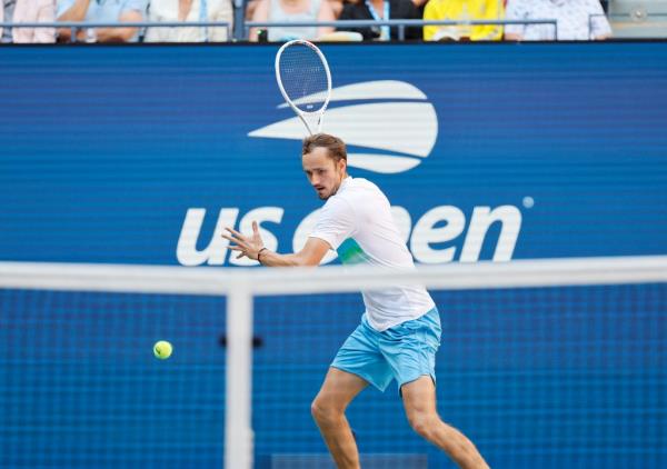 aniil Medvedev [5] returns a volley against Nuno Borges (POR) during their match on Arthur Ashe Stadium at the 2024 US Open Championship.