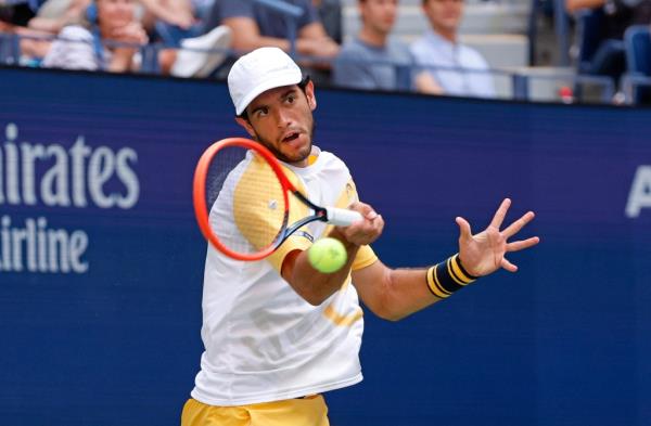 Nuno Borges (POR) returns a volley against Daniil Medvedev [5] during their match on Arthur Ashe.