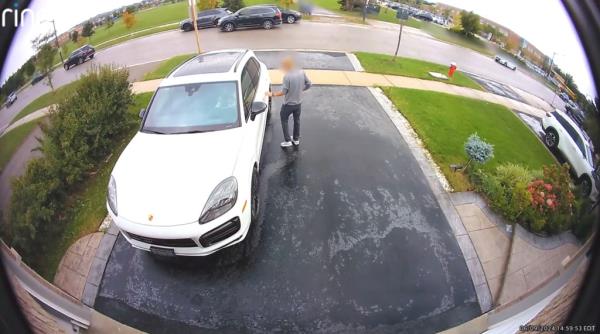 The victim's body was dragged into the street after the female suspect ran over him. 