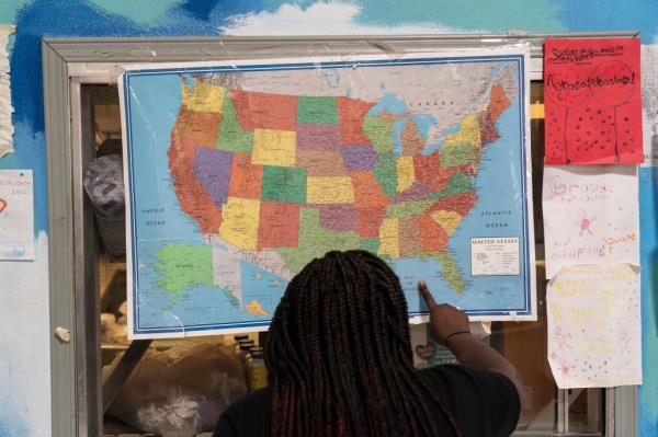 a man looking at a map