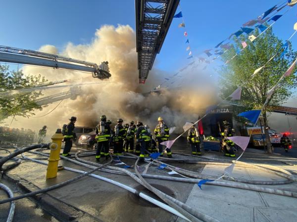 Firefighters respond to fire at Bushwick supermarket. 