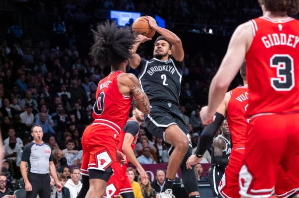 Brooklyn Nets forward Cameron Johnson (2) shoots over Chicago Bulls guard Coby White (0) in the second half at Barclays Center, Friday, Nov. 1, 2024, in Brooklyn, NY.
