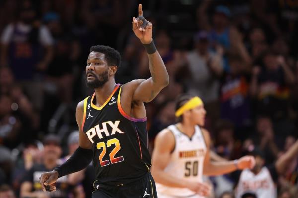 Deandre Ayton #22 of the Phoenix Suns reacts after scoring against the Denver Nuggets during the first half of Game Four of the NBA Western Co<em></em>nference Semifinals at Footprint Center on May 07, 2023