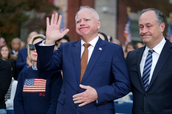 Walz reacts to the crowd before Harris' co<em></em>ncession speech at Howard University on Nov. 6, 2024.
