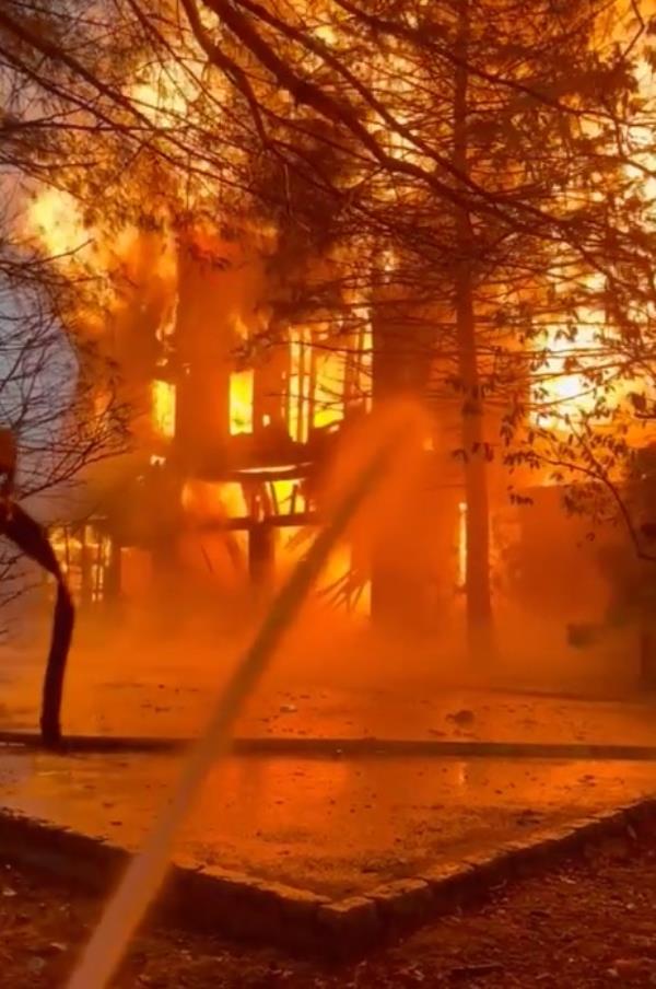 Fire crews attempted an aggressive fire attack as the garage fire began to quickly spread to the residence, but were thwarted by dangerous fire co<em></em>nditions and structural collapse.