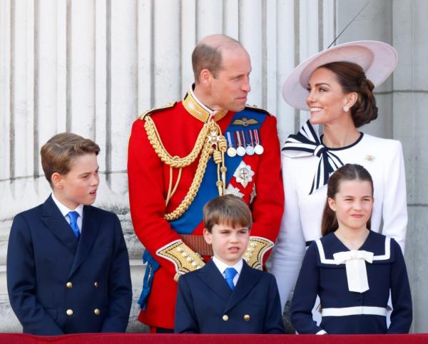 Prince William, Kate Middleton, and their children observing the RAF flypast from the Buckingham Palace balcony during Trooping the Colour, 2024.
