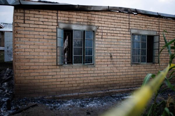 Tape cordons off a building inside the Lhubiriha Seco<em></em>ndary School.
