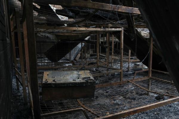 A dormitory destroyed by fire is seen inside the Lhubiriha Seco<em></em>ndary School.