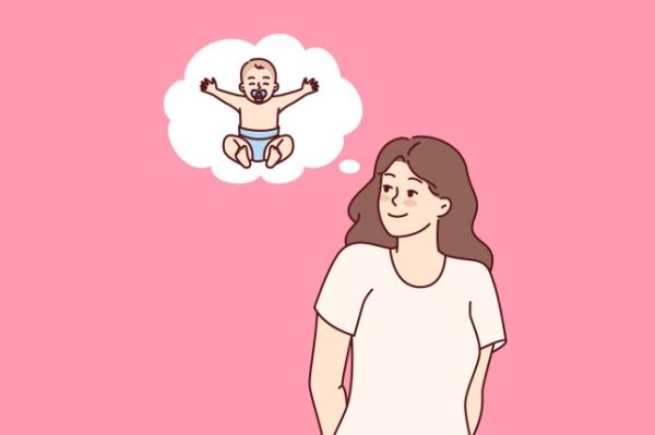 Woman dreams of giving birth to child and becoming mother for son or daughter after pregnancy