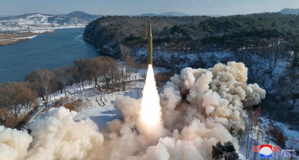 This photo, carried by North Korea's official Korean Central News Agency on Monday, shows the North's launch of a solid-fuel intermediate-range ballistic missile carrying a hyperso<em></em>nic warhead the previous day. (KCNA)